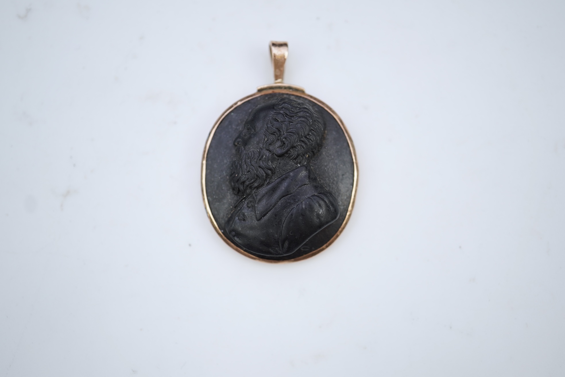 An unusual lava cameo pendant, late 19th century